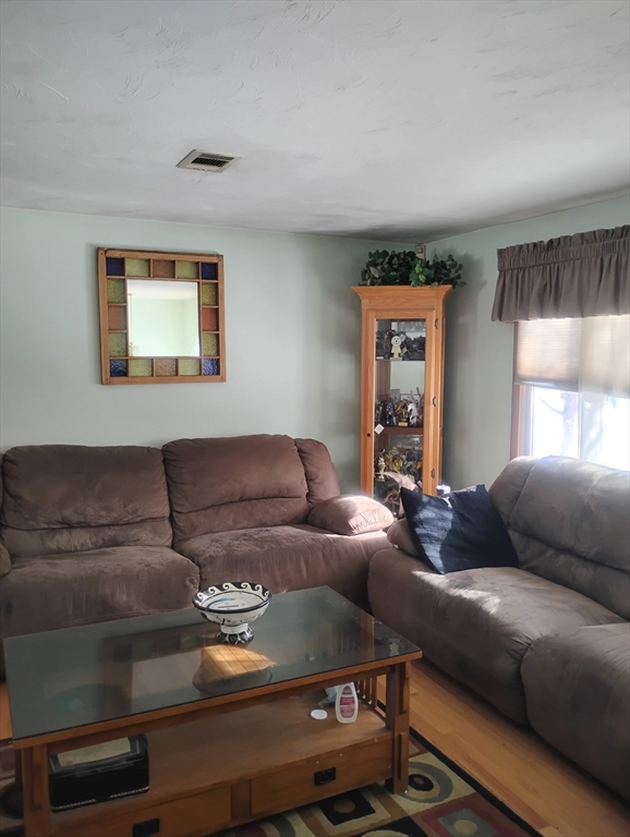 8 Tony Terrace Bridgewater, MA 02324 - Photo 4 of 5 a living room with furniture and a window