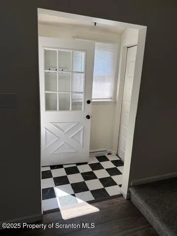 a view of a black and white checkered floor