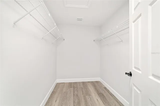 a view of a room with racks on the wall