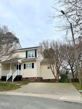 a view of a yard in front of a house