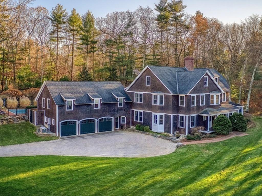 106 Koning Farm Road Carlisle, MA 01741 - Photo 1 of 39 a view of a big house with a big yard and large trees