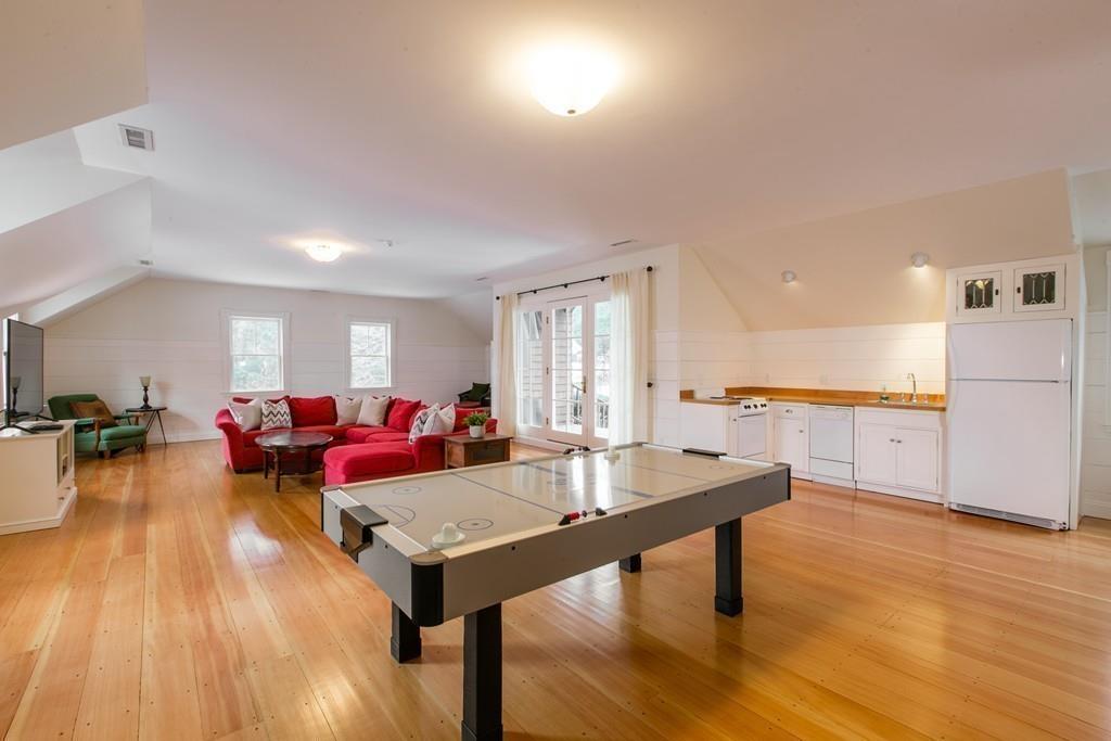 106 Koning Farm Road Carlisle, MA 01741 - Photo 25 of 39 a living room with furniture and wooden floor