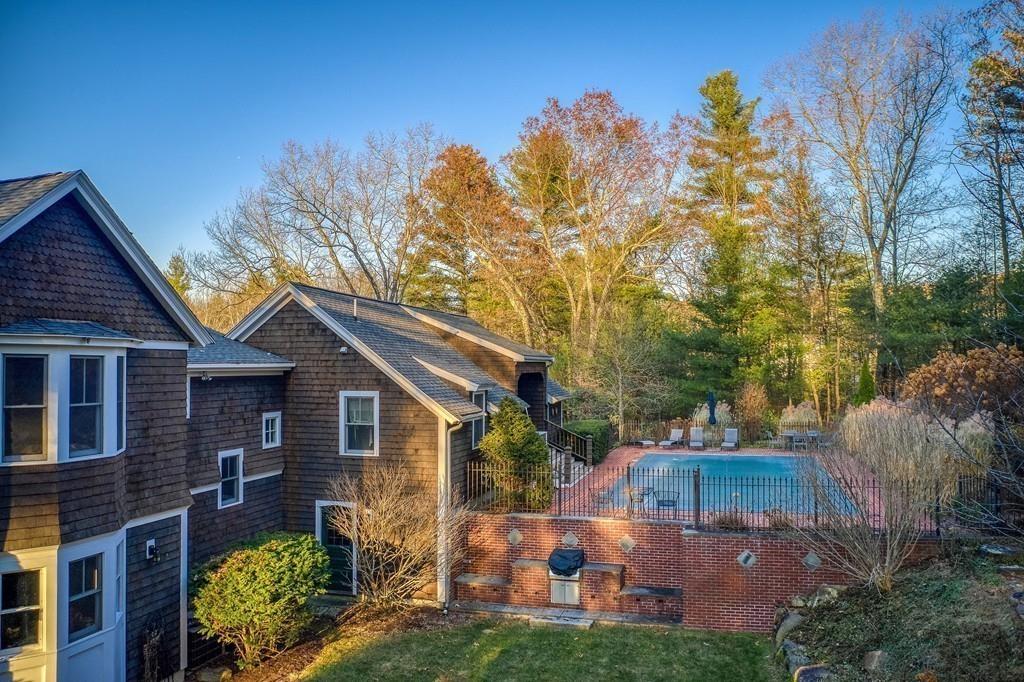106 Koning Farm Road Carlisle, MA 01741 - Photo 28 of 39 a front view of a house with garden