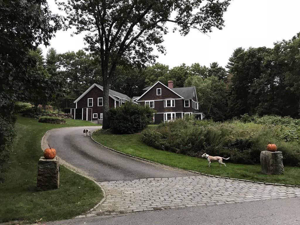 106 Koning Farm Road Carlisle, MA 01741 - Photo 36 of 39 a front view of a house with a yard