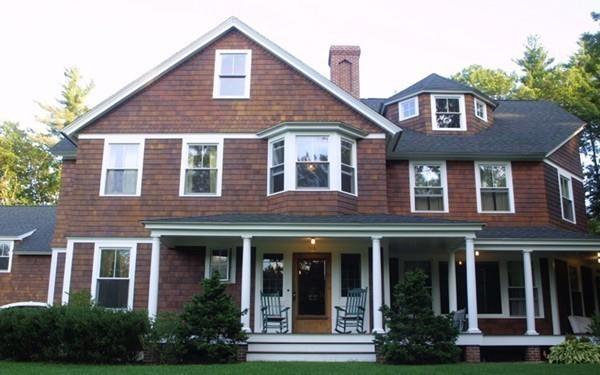 106 Koning Farm Road Carlisle, MA 01741 - Photo 37 of 39 a front view of a house with a yard