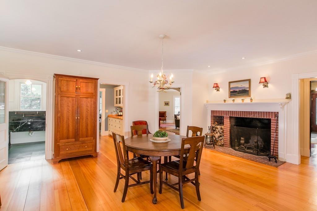 106 Koning Farm Road Carlisle, MA 01741 - Photo 5 of 39 a view of a livingroom with furniture and a fireplace