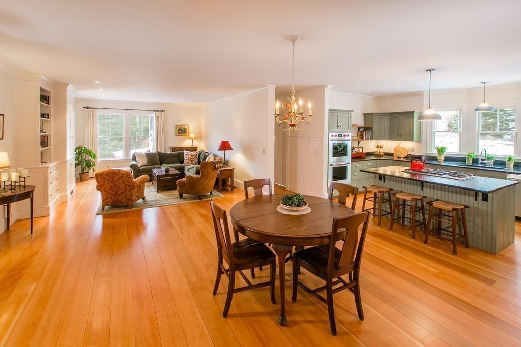 106 Koning Farm Road Carlisle, MA 01741 - Photo 6 of 39 a view of a dining room with furniture window and wooden floor