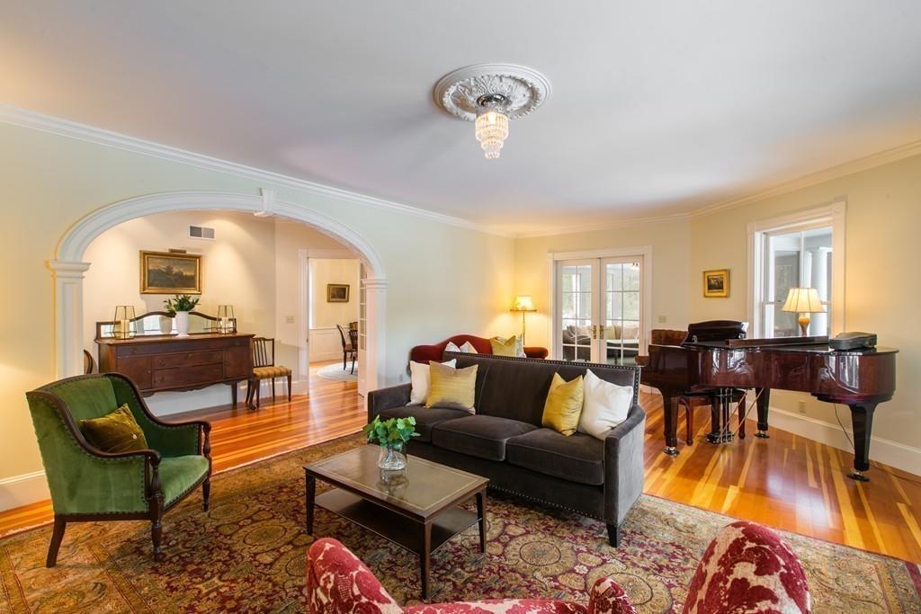 106 Koning Farm Road Carlisle, MA 01741 - Photo 9 of 39 a living room with furniture and a large window