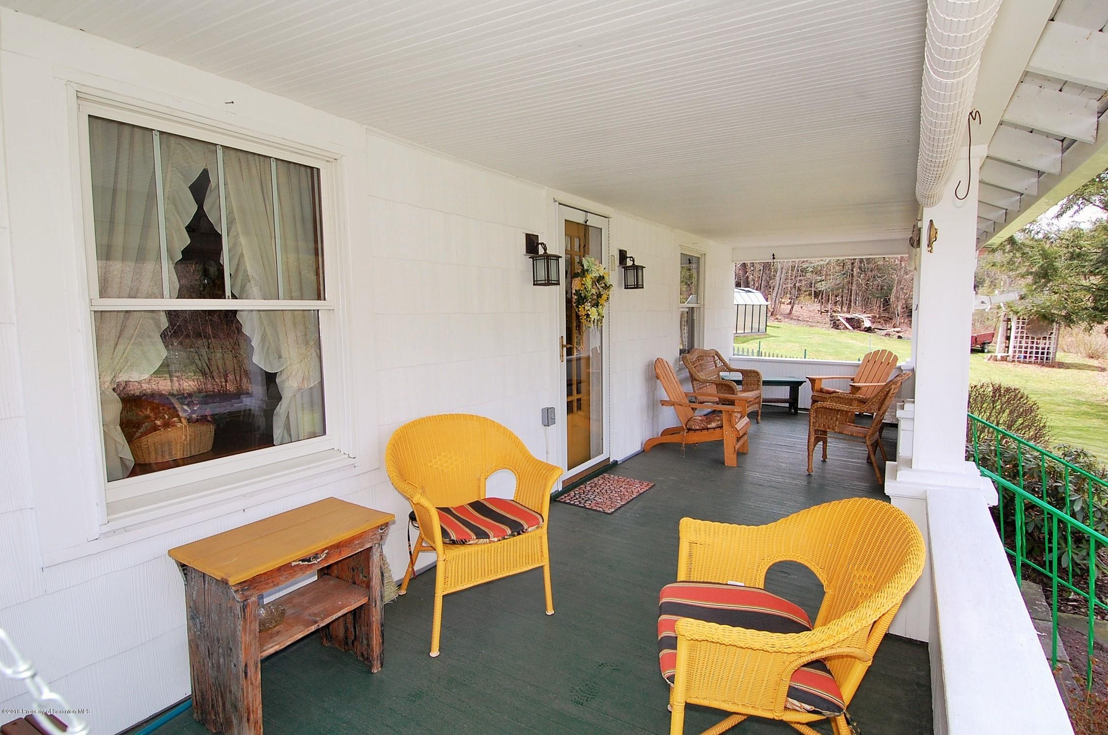 4126 State Rte 2012 Forest City, PA 18421 - Photo 3 of 66 a room with furniture and a window