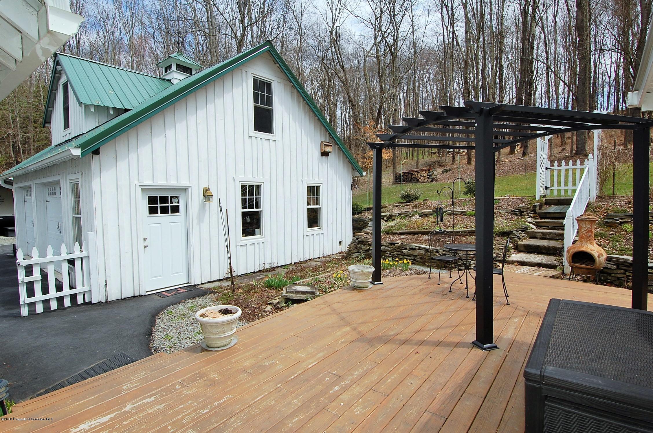 4126 State Rte 2012 Forest City, PA 18421 - Photo 35 of 66 a view of a house with backyard and sitting area