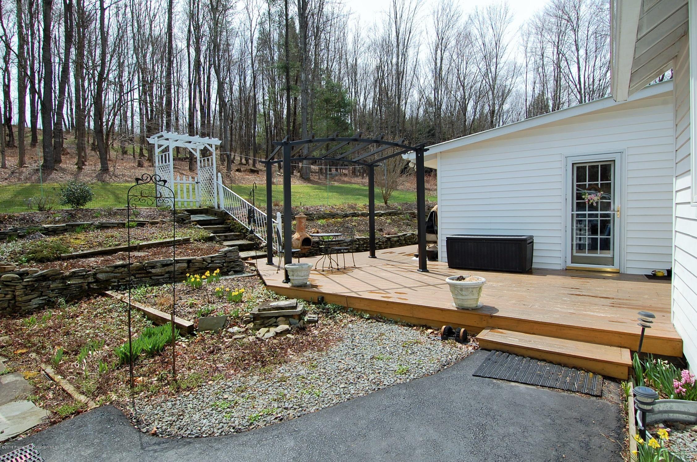 4126 State Rte 2012 Forest City, PA 18421 - Photo 38 of 66 a view of a backyard with sitting area