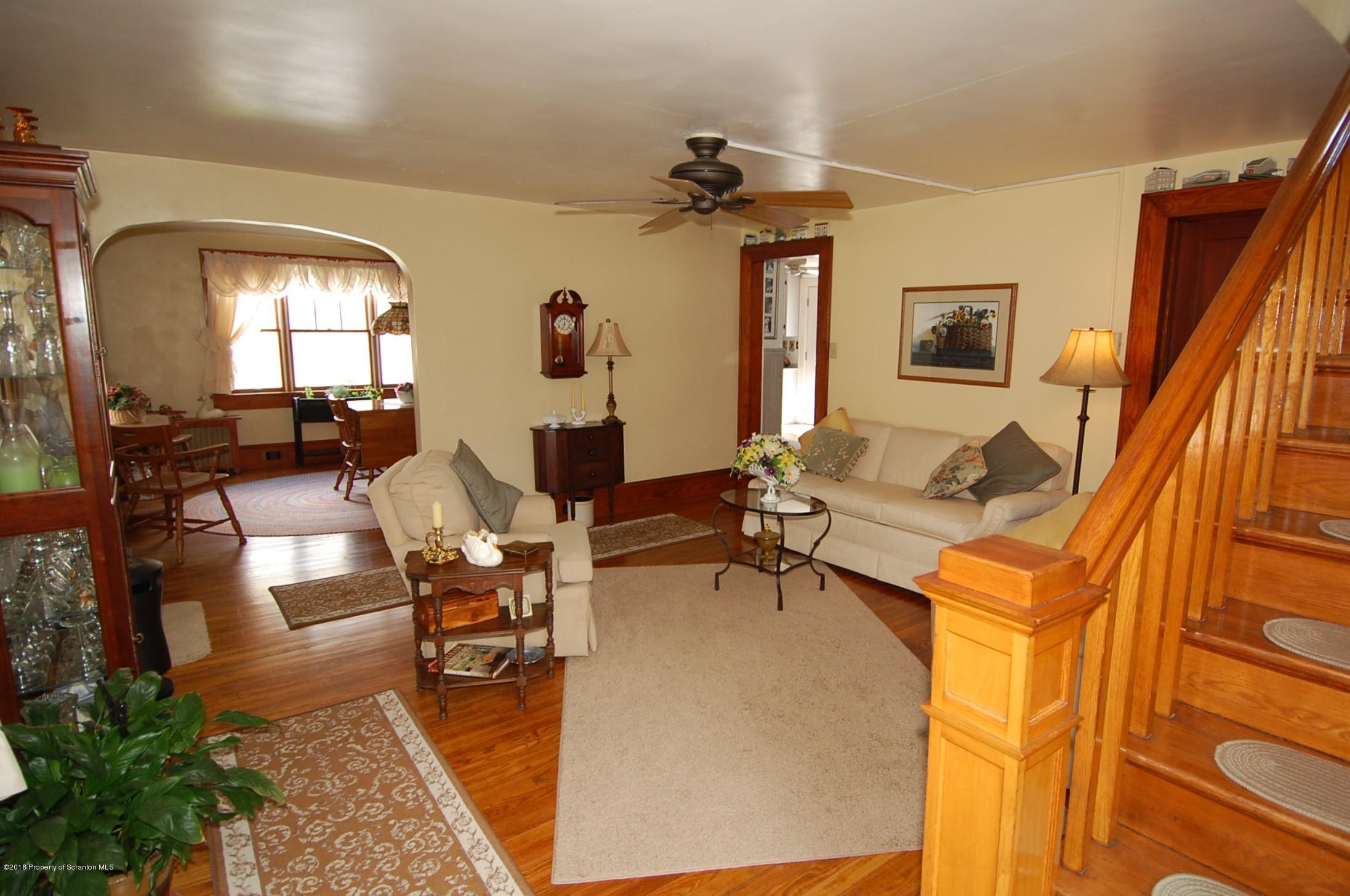 4126 State Rte 2012 Forest City, PA 18421 - Photo 6 of 66 a living room with patio furniture and a chandelier