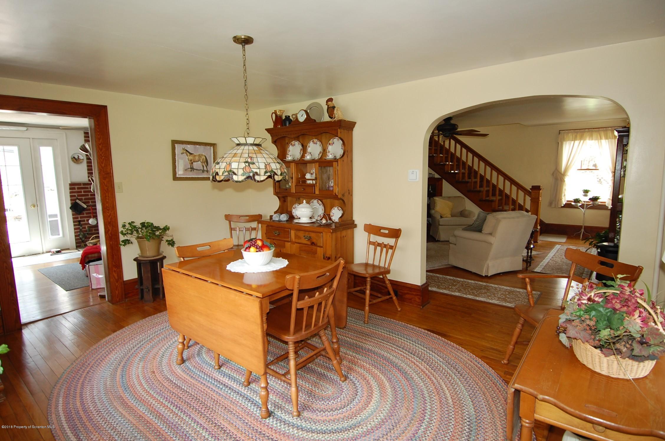 4126 State Rte 2012 Forest City, PA 18421 - Photo 7 of 66 a living room with hard wood flooring and a table