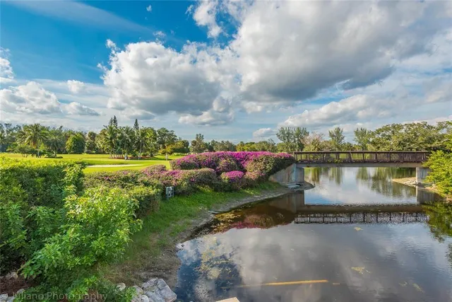 a view of a lake with a big yard