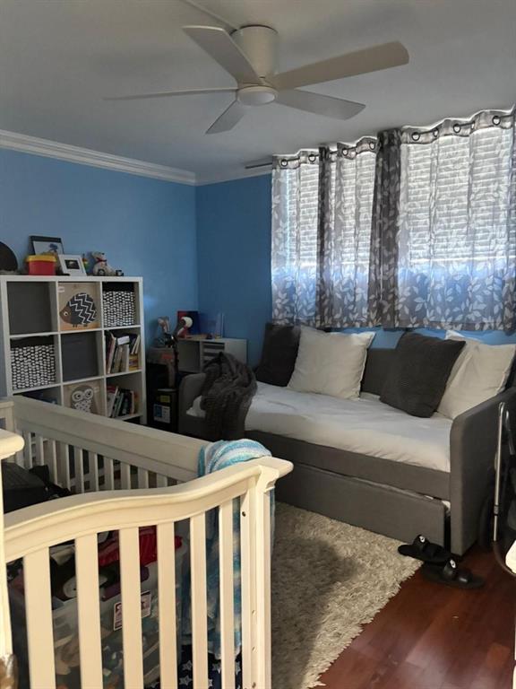 2450 DC Country Club Boulevard, Unit 203B Deerfield Beach, FL 33442 - Photo 10 of 19 a living room with furniture a window and bookshelf