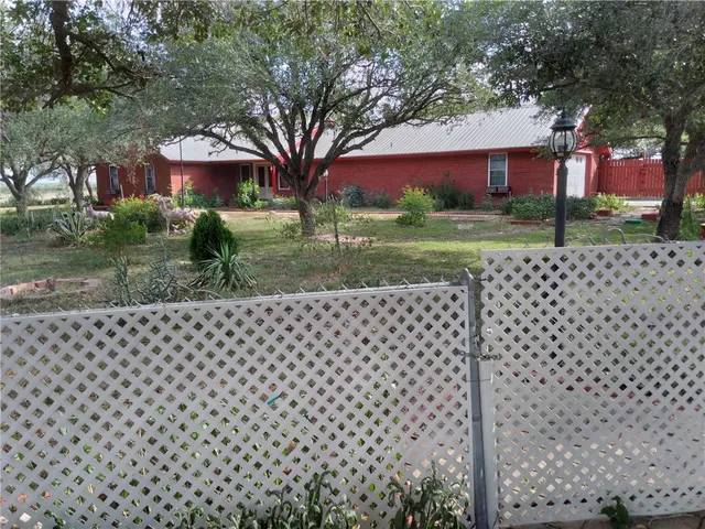 a view of yard with tree and green space