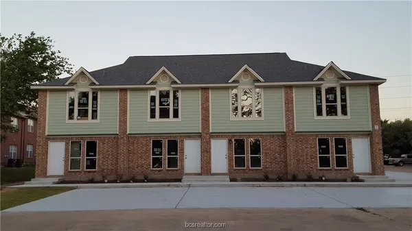 a front view of residential houses