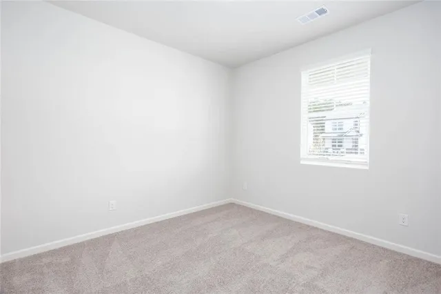 an empty room with a window