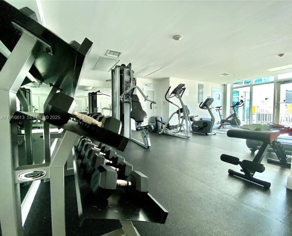 1723 Southwest 2nd Avenue, Unit PH09 Miami, FL 33129 - Photo 20 of 21 a view of a room with gym equipment