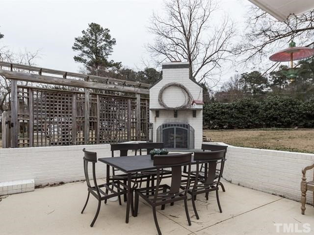 4516 Pitt Street Raleigh, NC 27609 - Photo 20 of 24 Entertainment Patio w/ Brick Fireplace