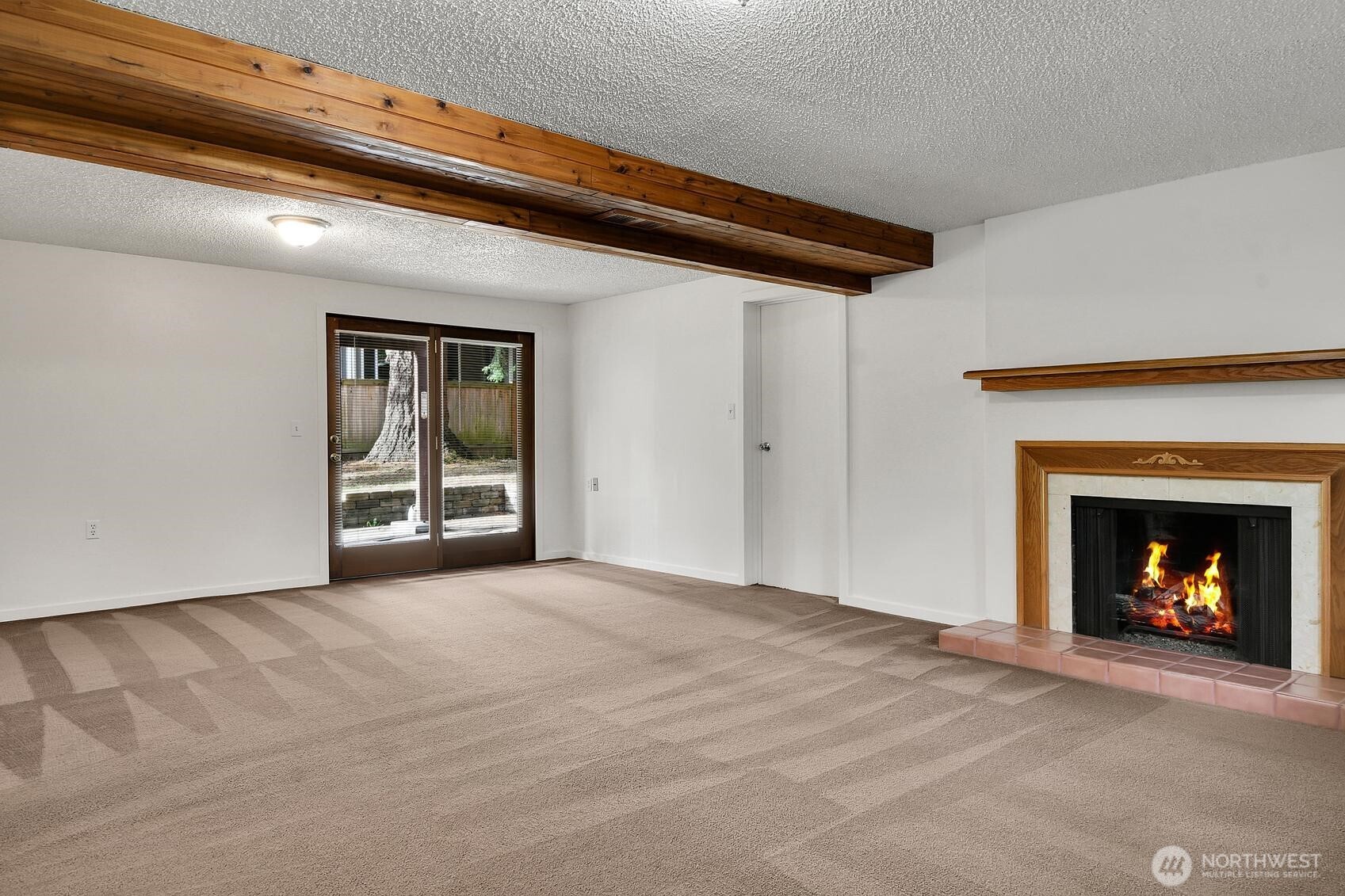 19414 1st Avenue Southeast Bothell, WA 98012 - Photo 18 of 27 a view of an empty room with a fireplace