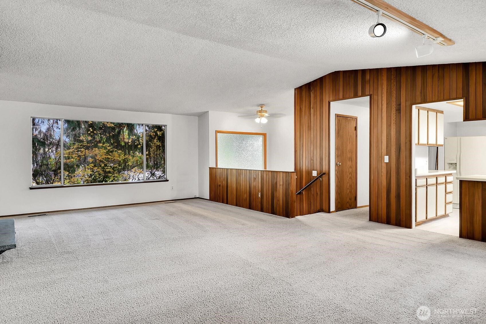 19414 1st Avenue Southeast Bothell, WA 98012 - Photo 6 of 27 an empty room with windows and closet