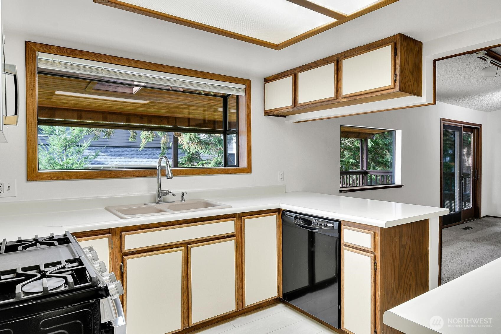 19414 1st Avenue Southeast Bothell, WA 98012 - Photo 8 of 27 a kitchen with stainless steel appliances granite countertop a sink and a stove