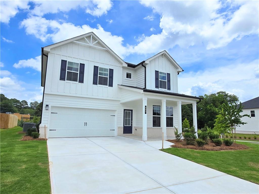 a view of house and outdoor space with yard
