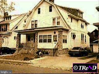 535 Laurel Road Yeadon, PA 19050 - Photo 1 of 1 a front view of a house with a yard