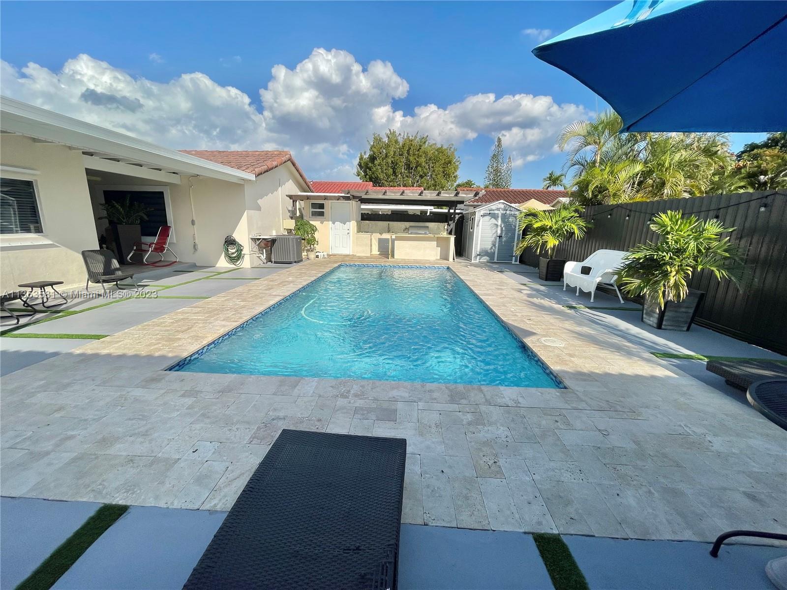 13850 Southwest 22nd Street Miami, FL 33175 - Photo 15 of 23 a view of a backyard