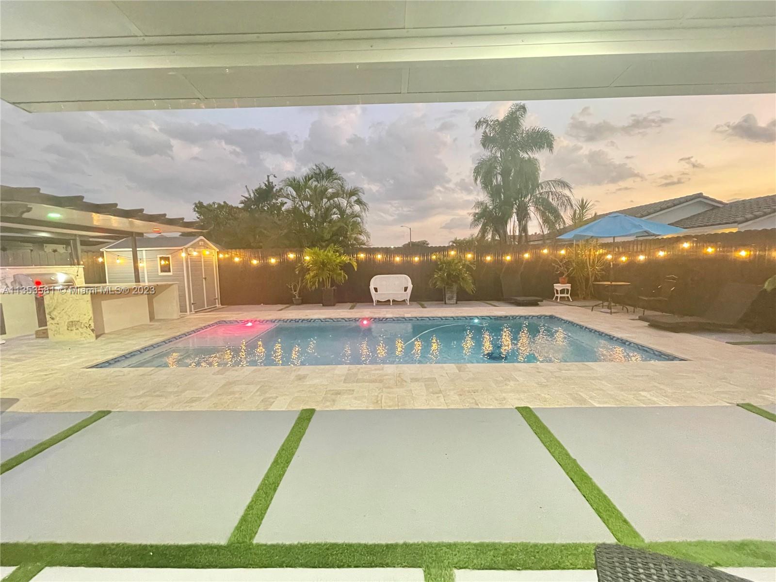 13850 Southwest 22nd Street Miami, FL 33175 - Photo 22 of 23 a view of a swimming pool