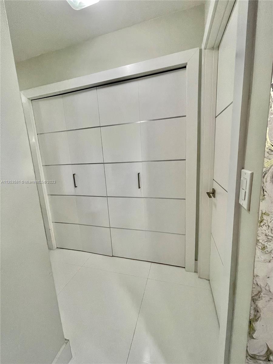 13850 Southwest 22nd Street Miami, FL 33175 - Photo 9 of 23 a bathroom with a bathtub