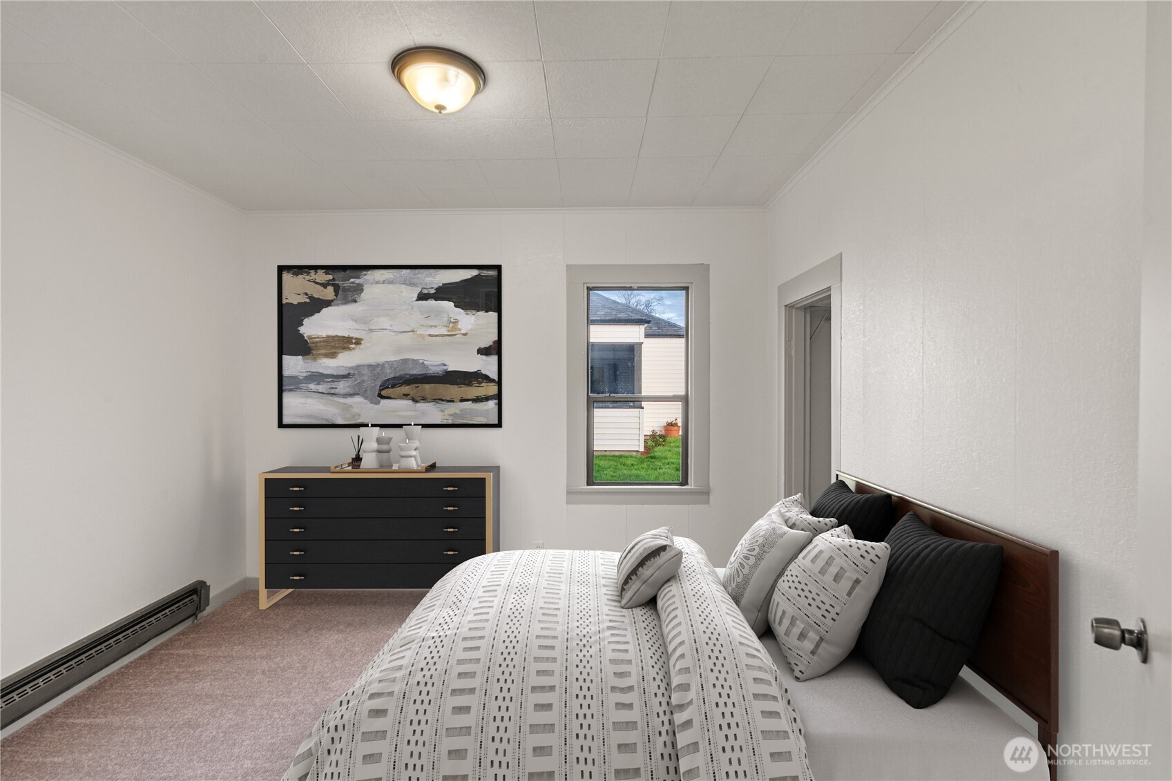 3003 Sumner Avenue Hoquiam, WA 98550 - Photo 15 of 26 a bedroom with a bed and window