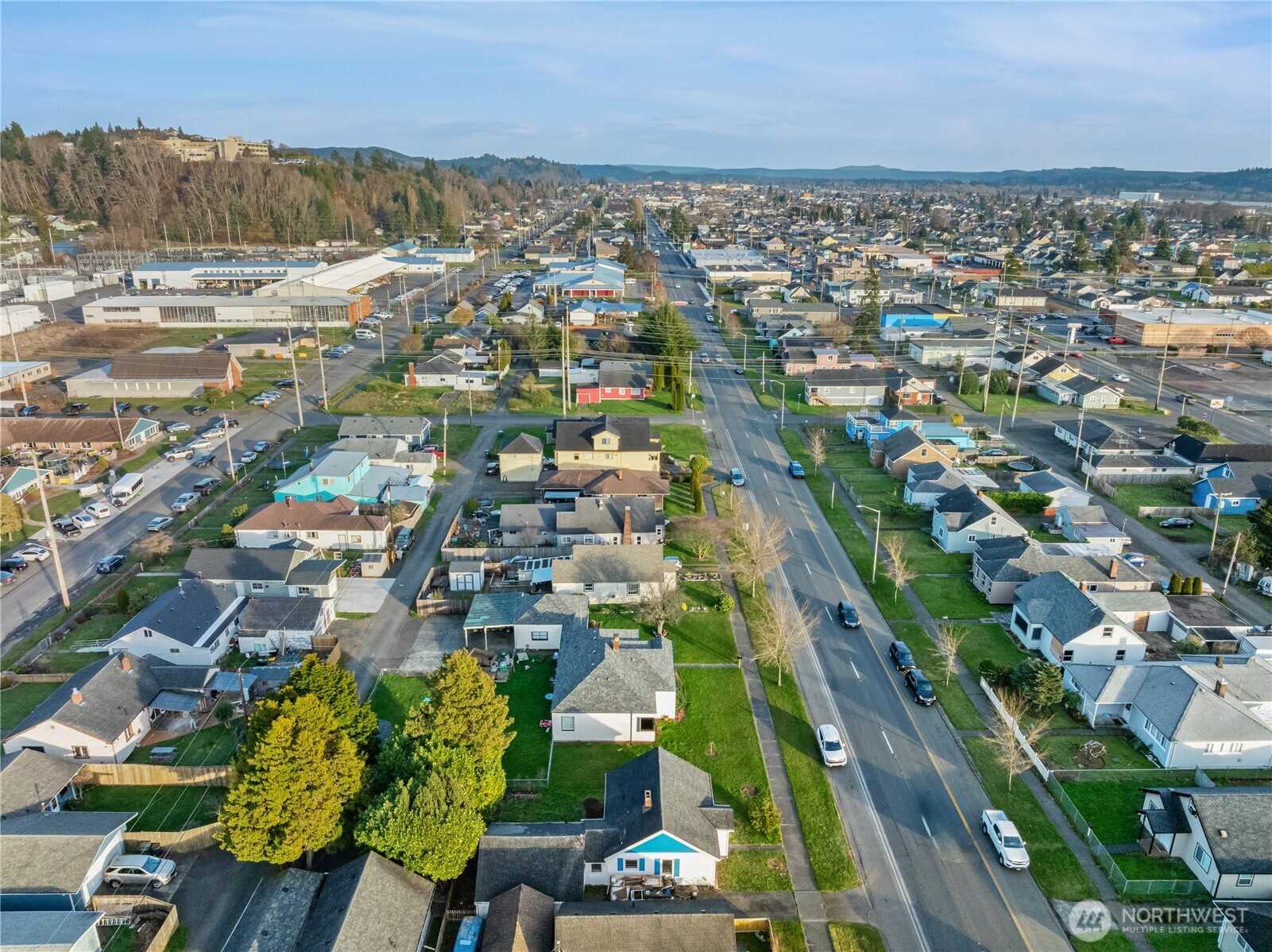3003 Sumner Avenue Hoquiam, WA 98550 - Photo 22 of 26 an aerial view of residential houses with outdoor space