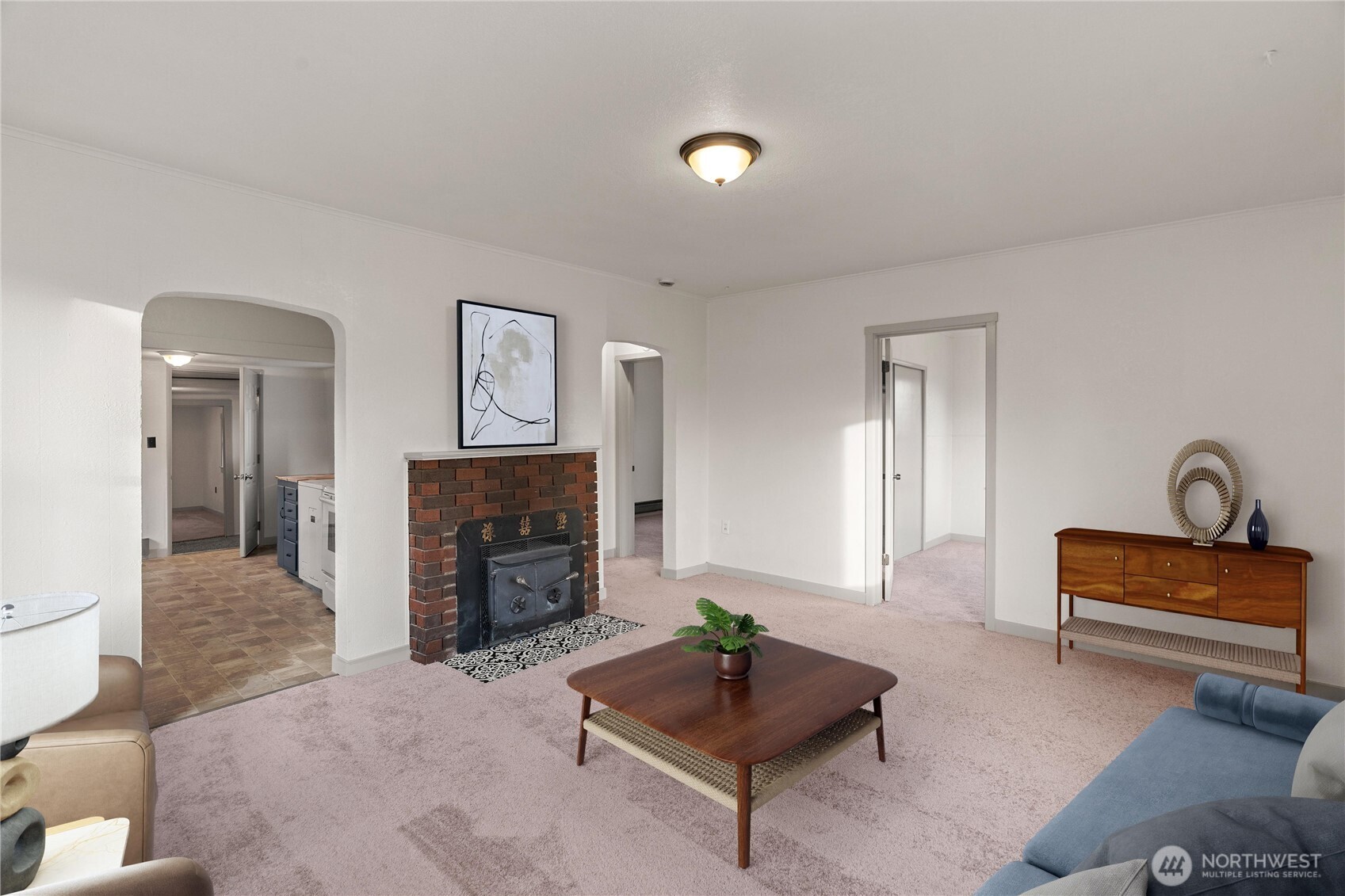 3003 Sumner Avenue Hoquiam, WA 98550 - Photo 4 of 26 a living room with furniture and a fireplace