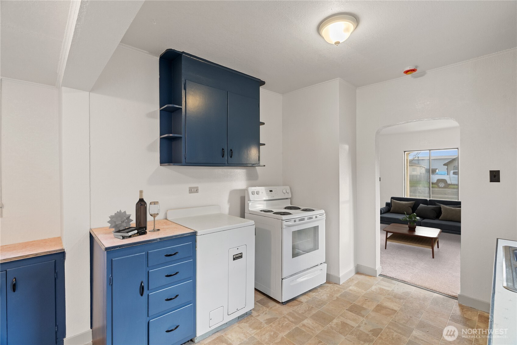 3003 Sumner Avenue Hoquiam, WA 98550 - Photo 8 of 26 a kitchen with cabinets and appliances