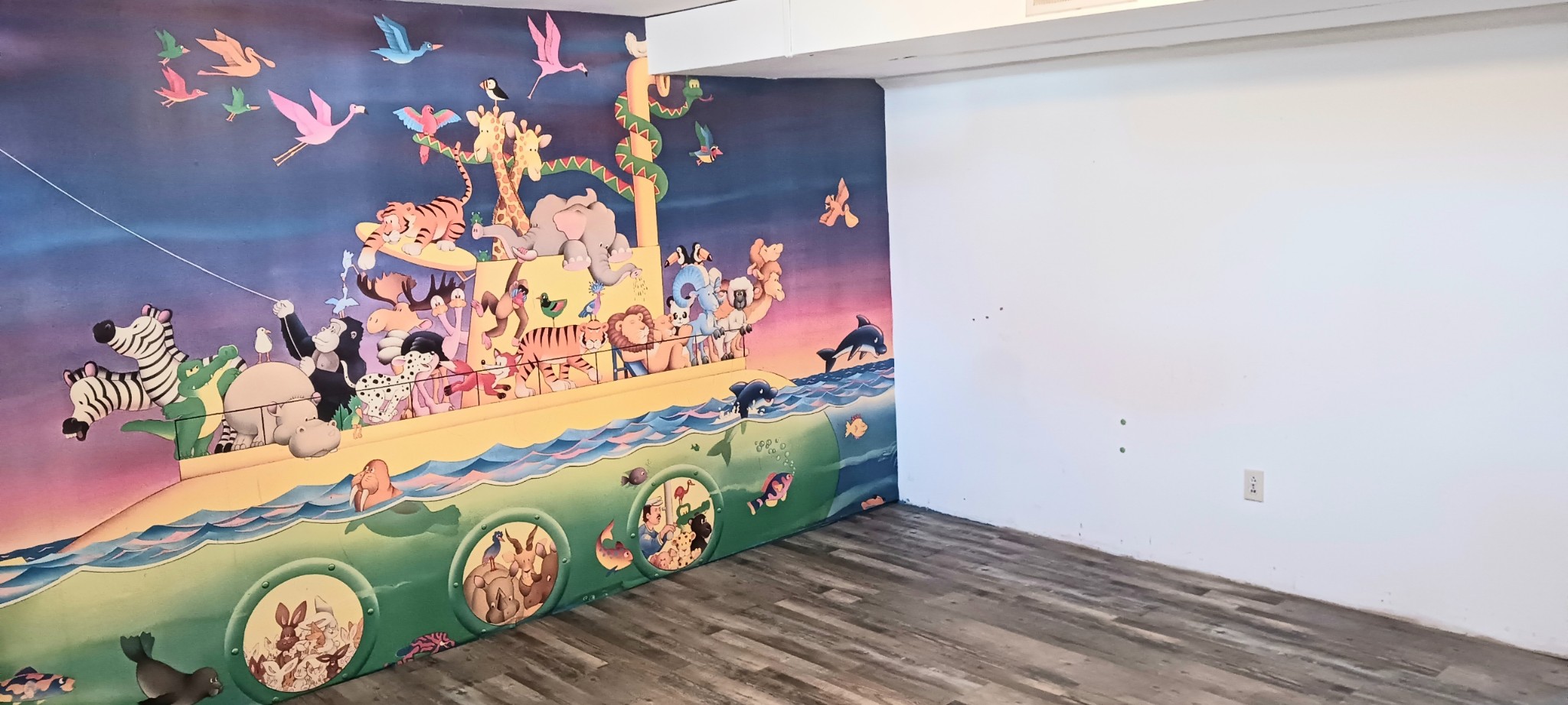 713 College Street Portland, TN 37148 - Photo 7 of 8 a bathroom with a mirror and painting on the wall