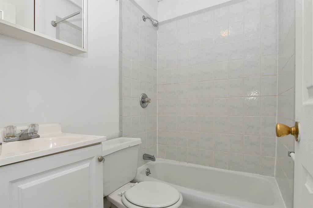 118 Adams Street, Unit 6 Hoboken, NJ 07030 - Photo 14 of 17 a bathroom with a sink toilet and shower