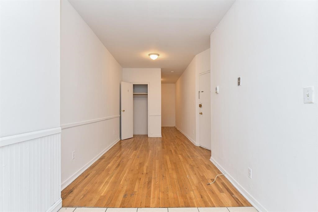 118 Adams Street, Unit 6 Hoboken, NJ 07030 - Photo 2 of 17 a view of a room with wooden floor