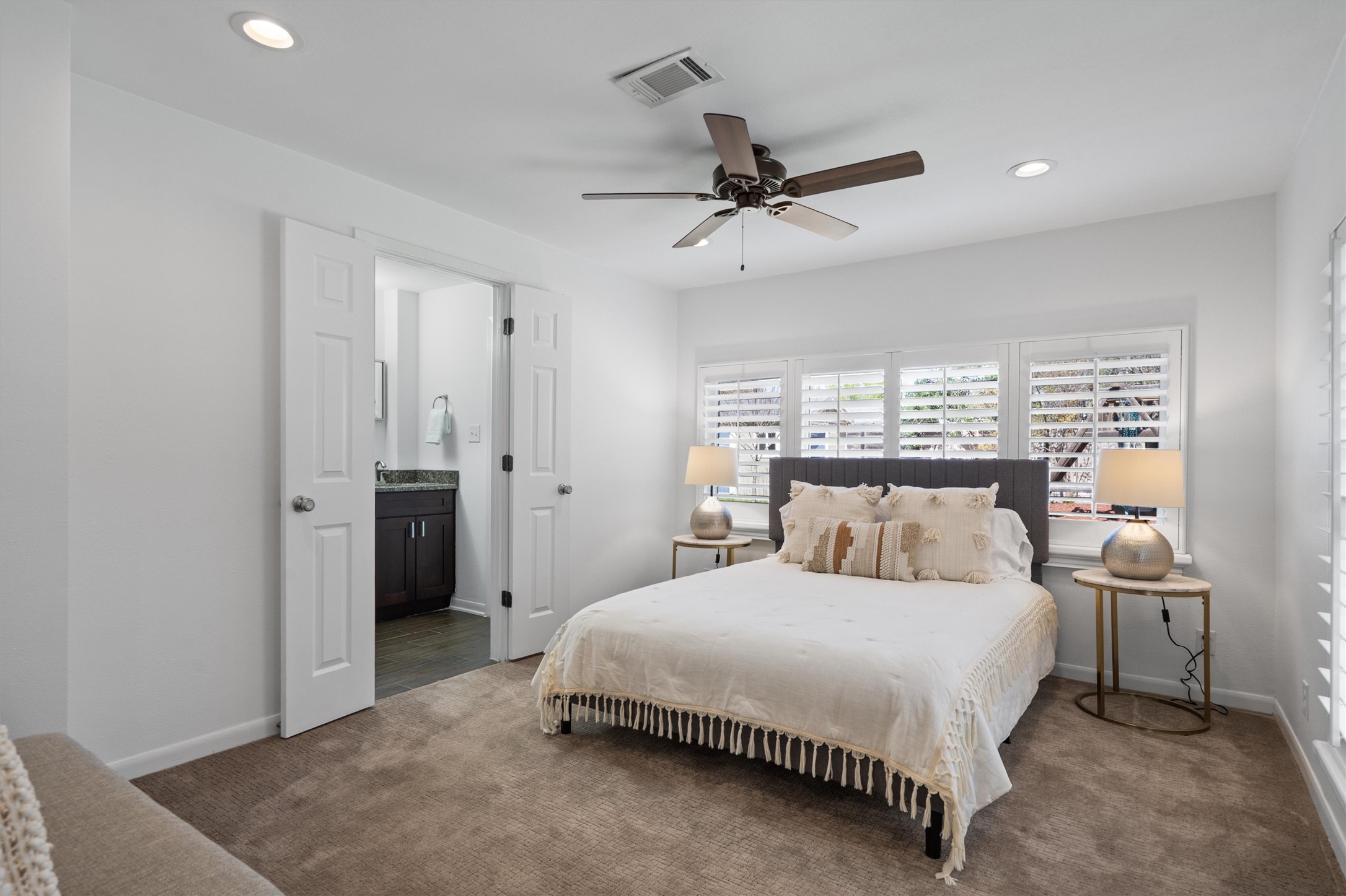 1904 Morrow Street Austin, TX 78757 - Photo 18 of 28 The primary suite is set apart from the other bedrooms for a little extra privacy.