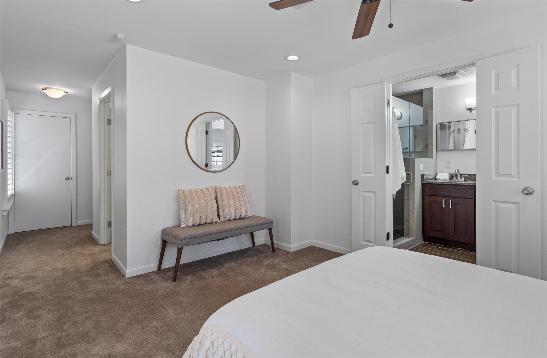 1904 Morrow Street Austin, TX 78757 - Photo 19 of 28 The primary features its own ensuite and a walk-in closet.