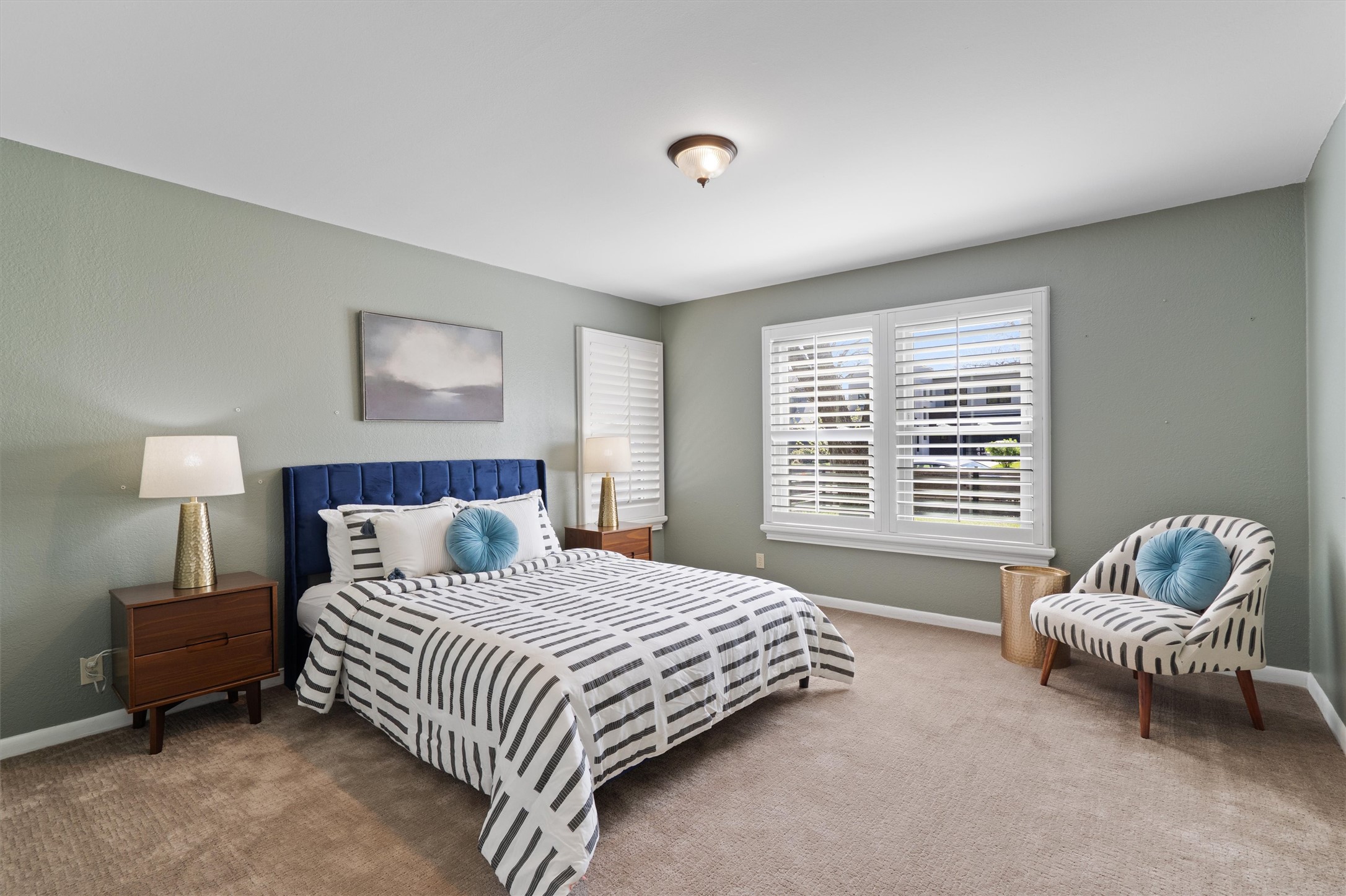 1904 Morrow Street Austin, TX 78757 - Photo 21 of 28 This generously sized bedroom offers plenty of space.
