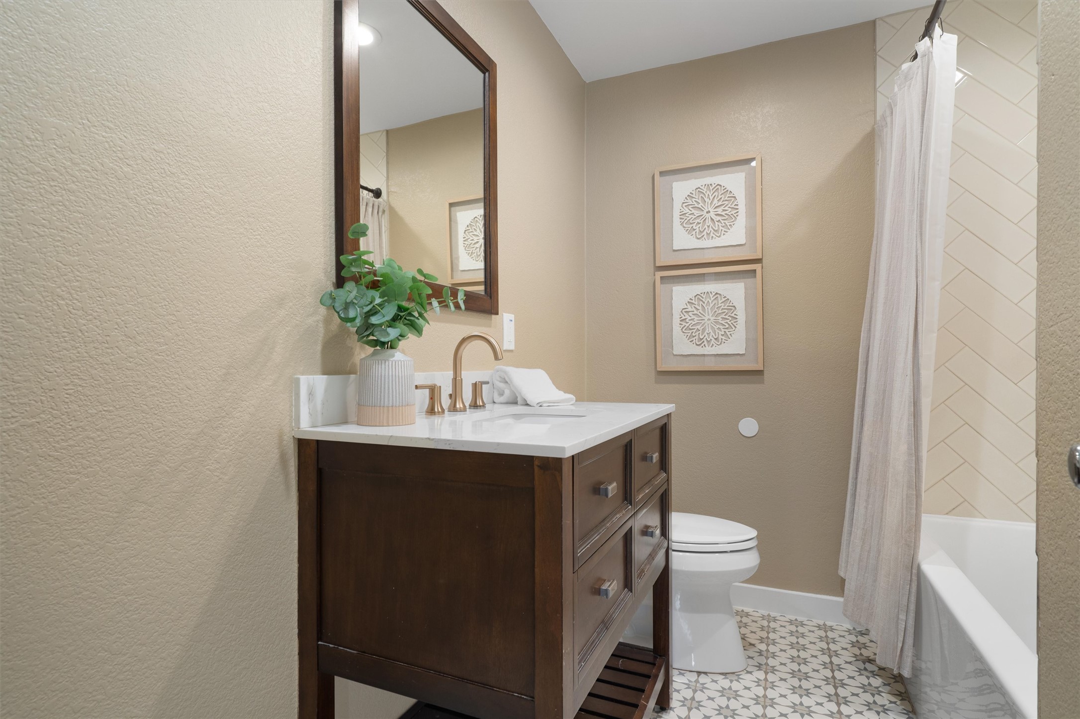 1904 Morrow Street Austin, TX 78757 - Photo 23 of 28 Another full bathroom features an updated vanity, fresh finishes, and a clean, polished look.