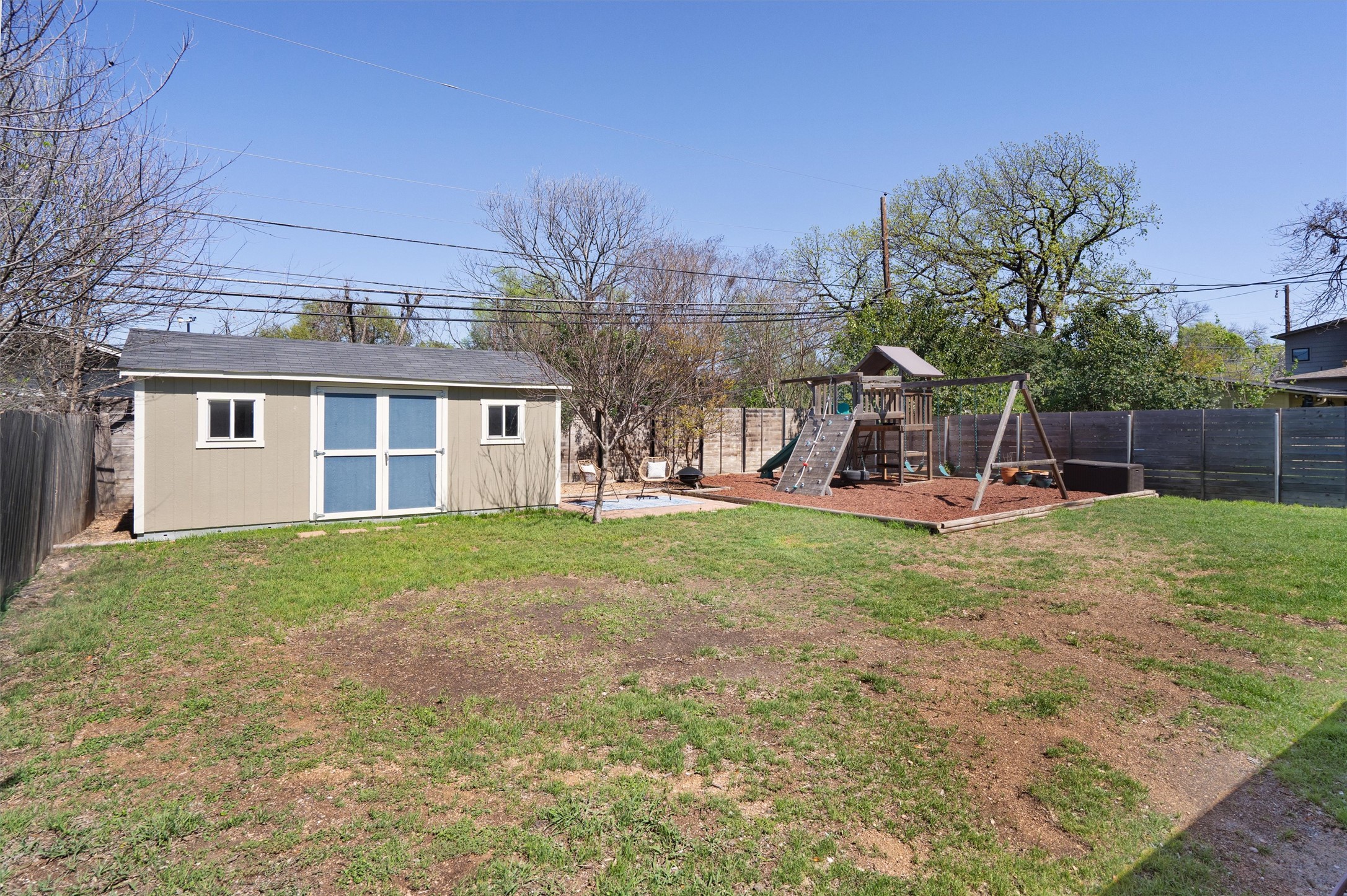 1904 Morrow Street Austin, TX 78757 - Photo 27 of 28 The storage shed is a practical bonus, with a look that ties in nicely with the home while giving you extra room for tools.