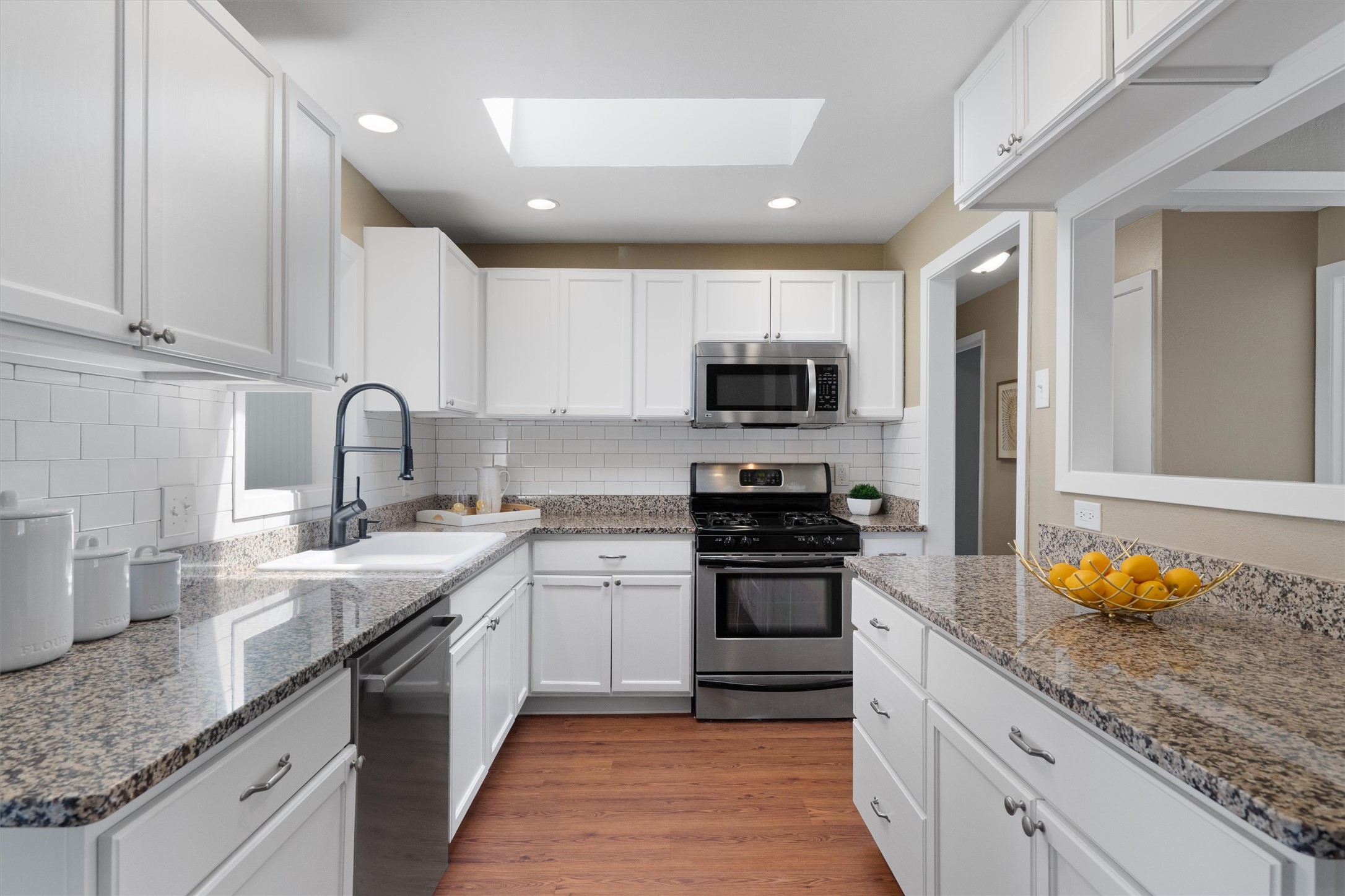 1904 Morrow Street Austin, TX 78757 - Photo 3 of 28 The kitchen keeps the look clean and timeless.