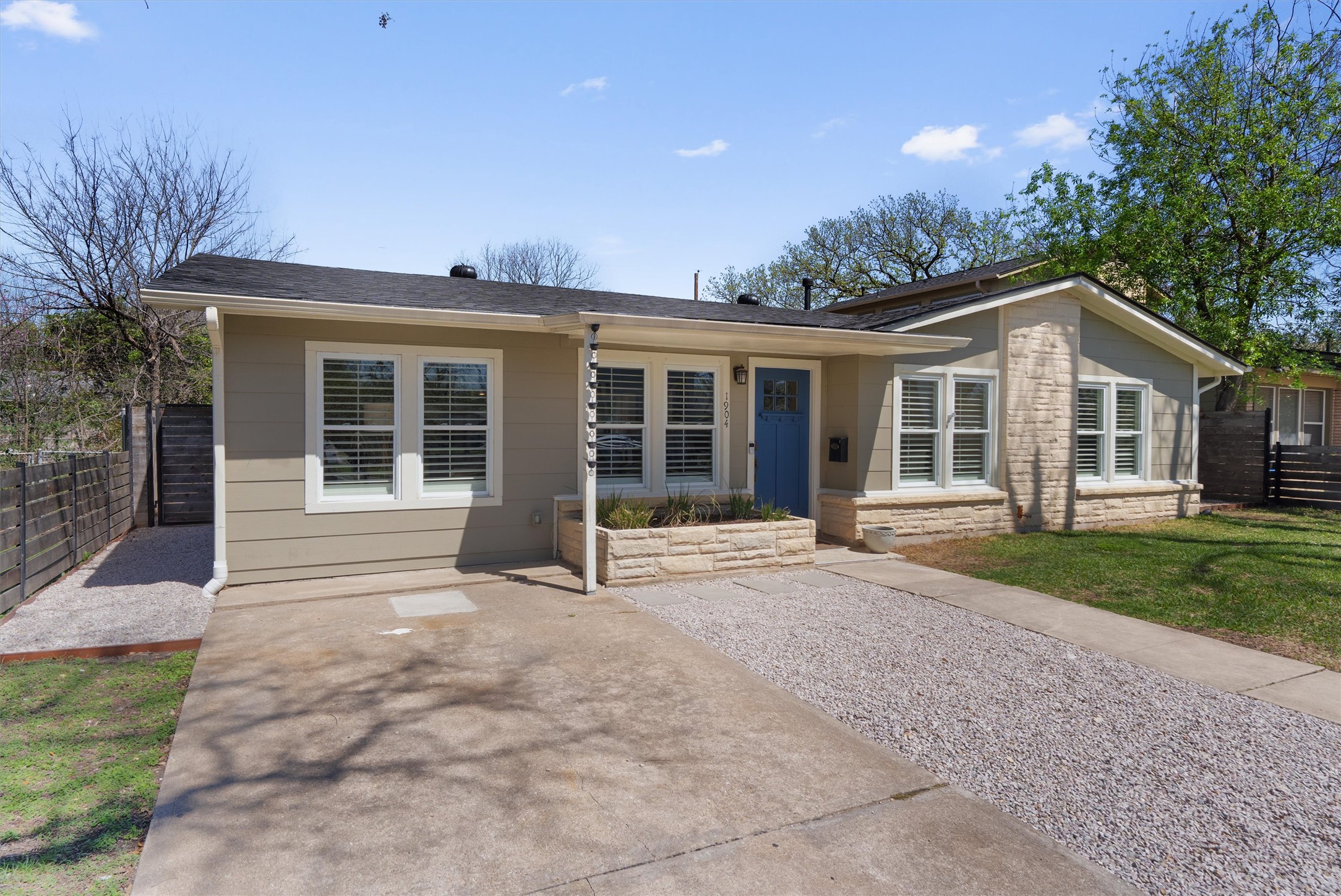 1904 Morrow Street Austin, TX 78757 - Photo 5 of 28 Thoughtful xeriscaping throughout the yard adds texture, function, and an easy maintenance.