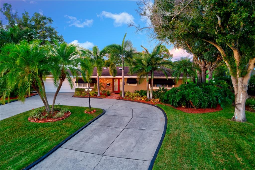 650 Poinsettia Road Belleair, FL 33756 - Photo 1 of 1 Landscaped front view