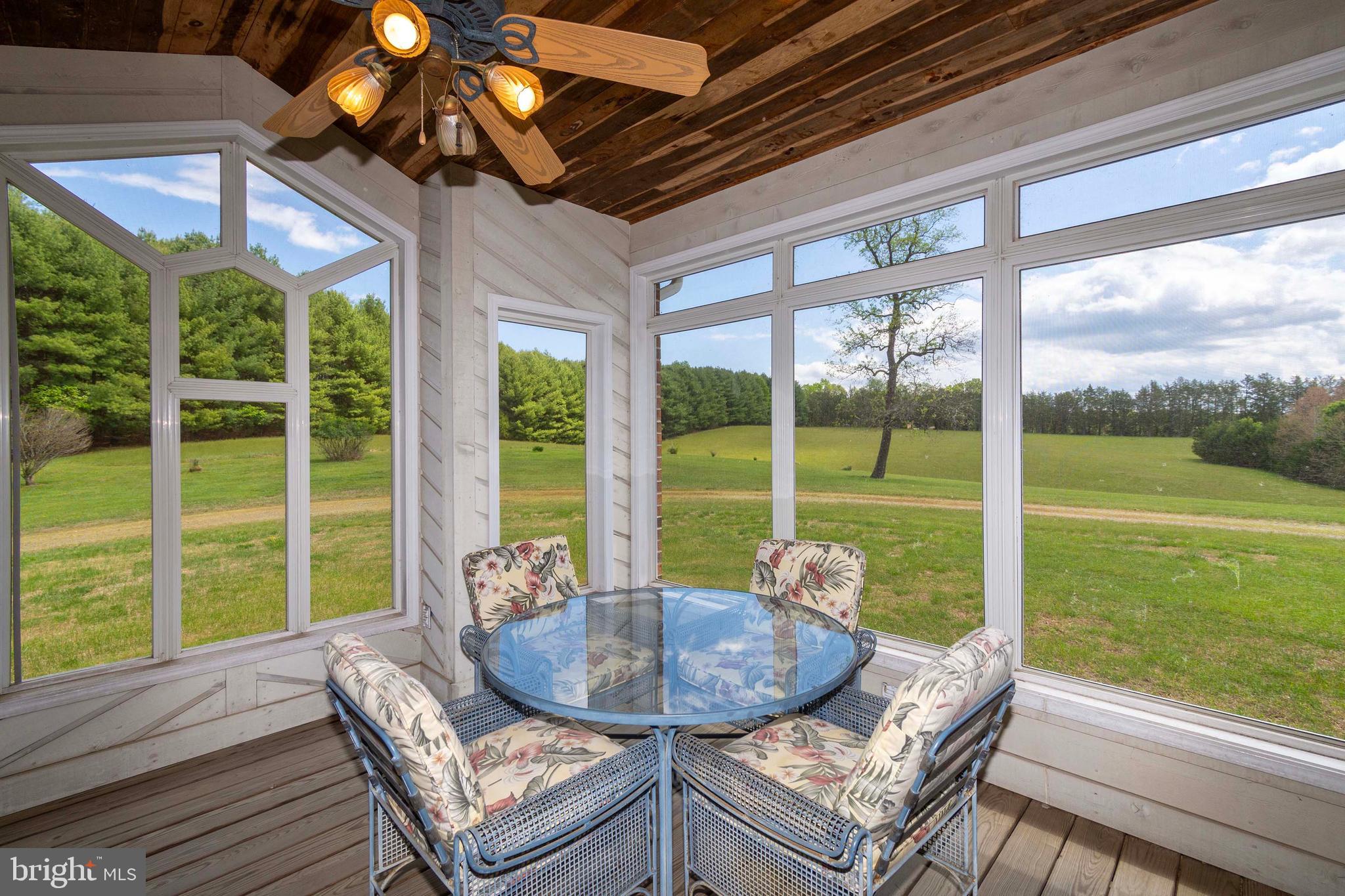 6000 Haleys Mill Road Spotsylvania, VA 22551 - Photo 13 of 85 a dining room with glass top table and chairs