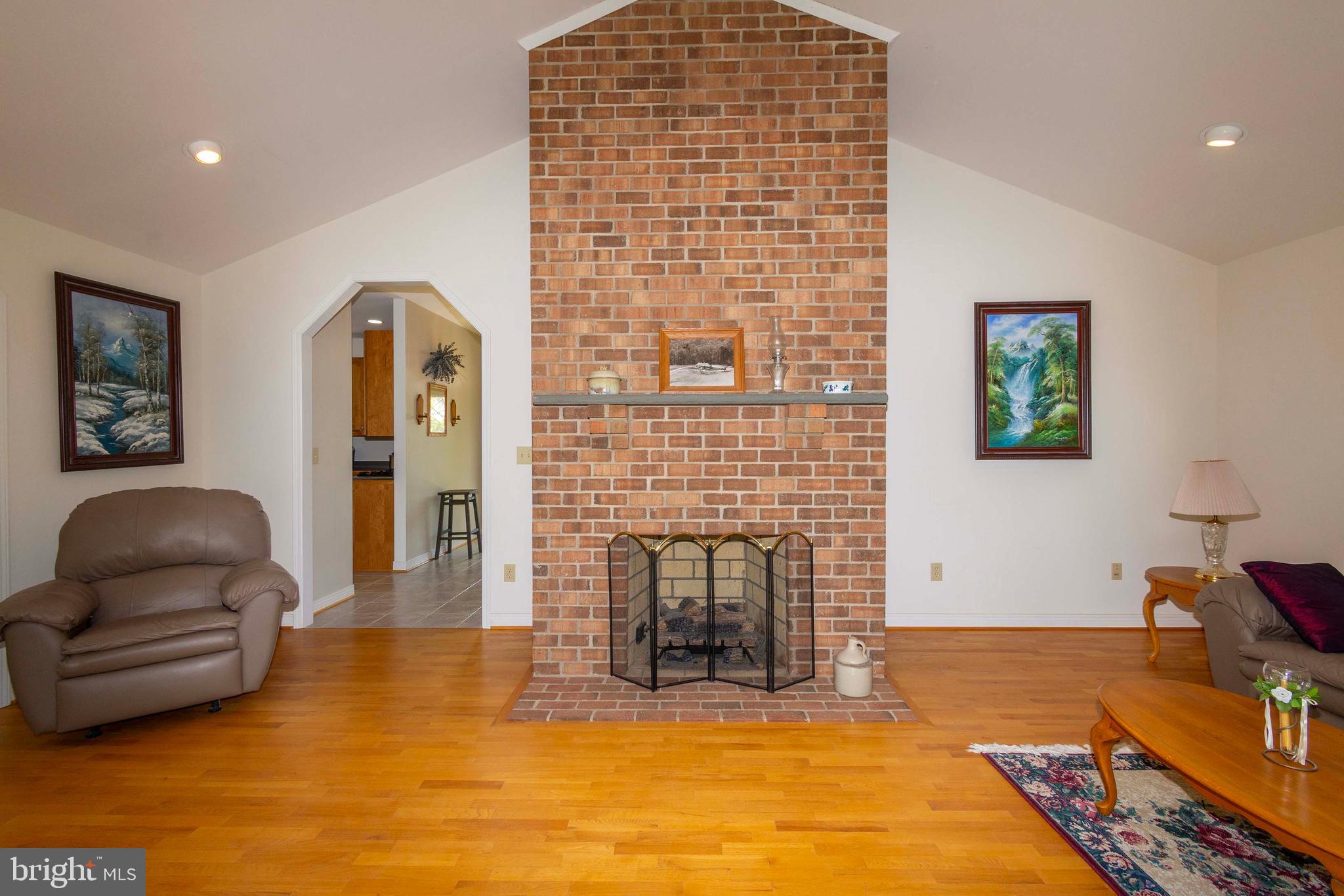6000 Haleys Mill Road Spotsylvania, VA 22551 - Photo 21 of 85 a living room with furniture and a fireplace