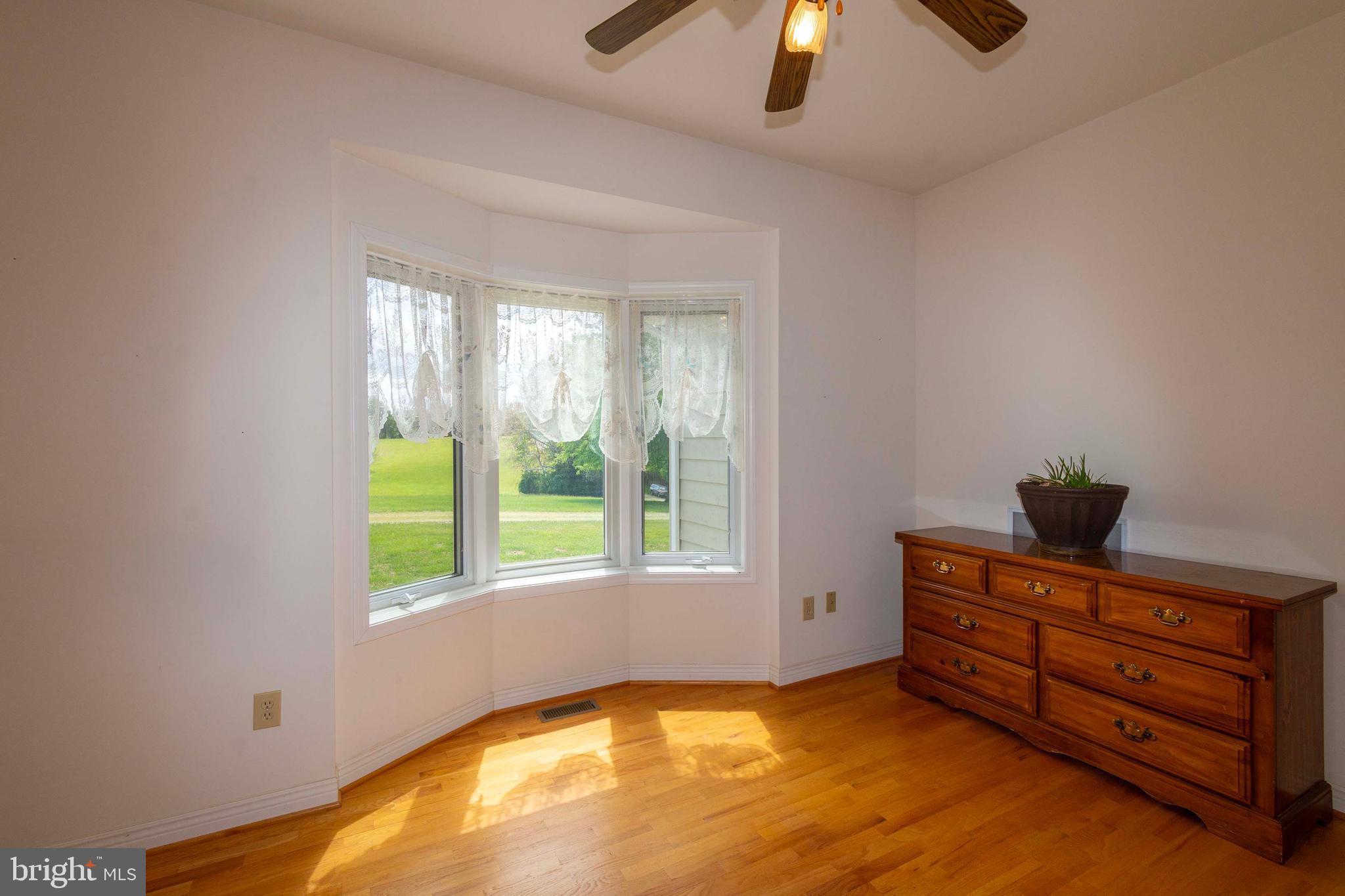 6000 Haleys Mill Road Spotsylvania, VA 22551 - Photo 35 of 85 a room with window and lamp